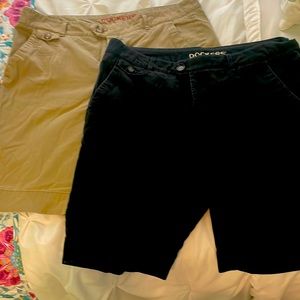 2 pairs of Dockers shorts black and khaki tan in color. Very gently worn.